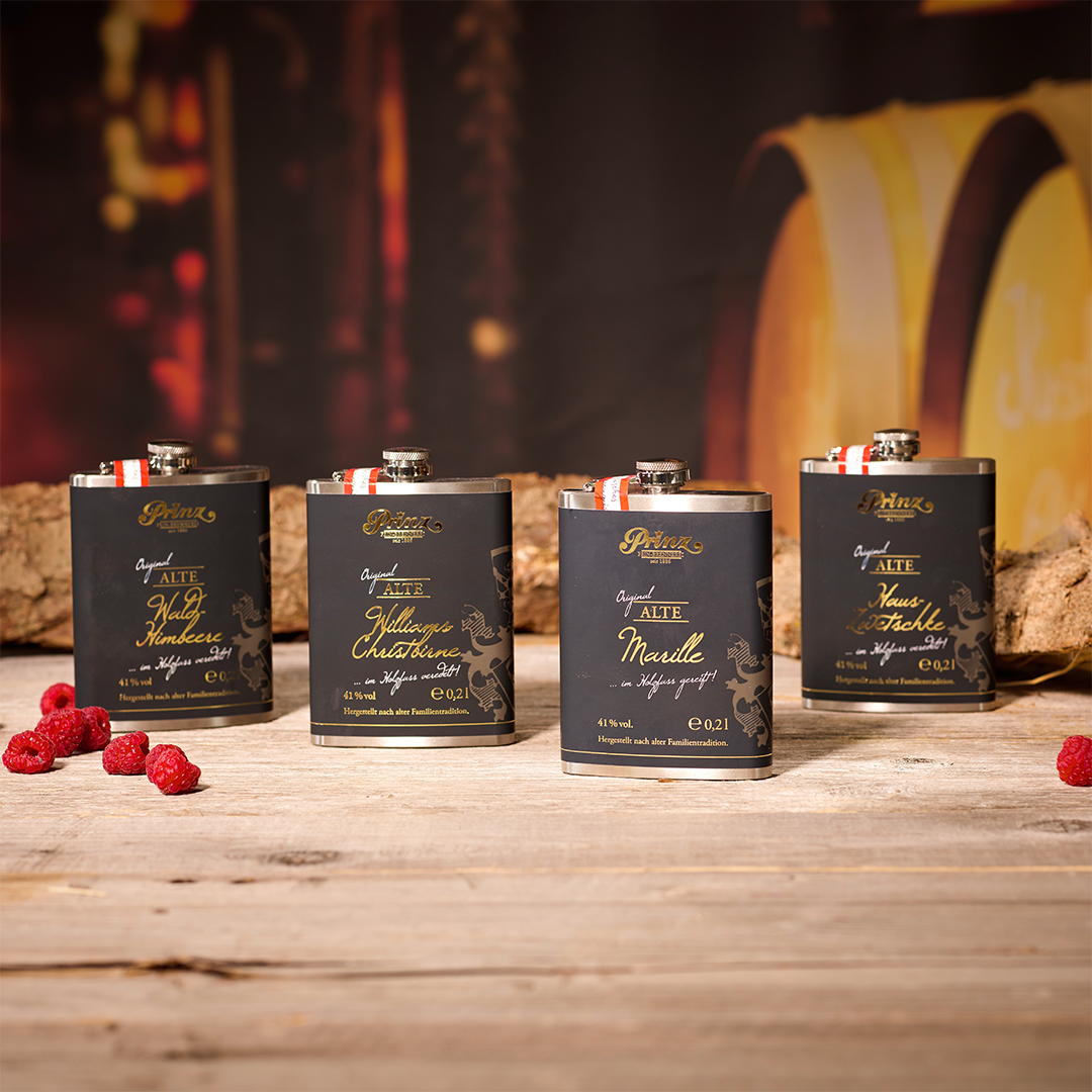 Edelstahl-Flachmann mit Schnaps Edelstahl-Flachmann mit Schnaps